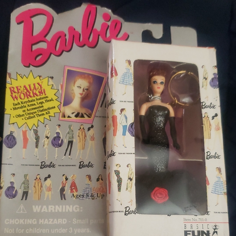 Vintage Barbie in Elegant Black with Red Rose Accent